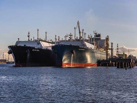 LNG is transferred from tanker to a stationary floating terminal