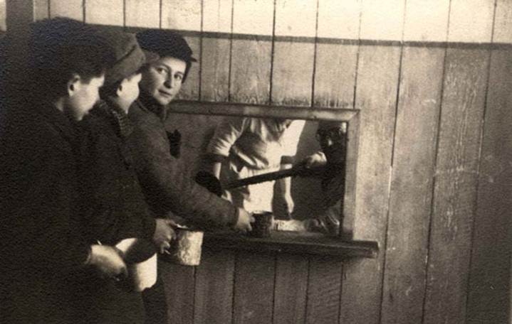 December 1943, Youth in line for distribution of soup in the workers' kitchen in the Kovno Ghetto, Lithuania