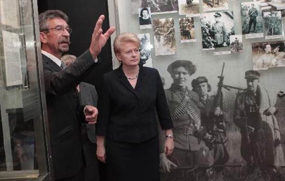 KGB Museum (Genocido Auku Muziejus): KGB museum director E.Peikstenis and Lithuania president D.Grybauskaite at KGB museum